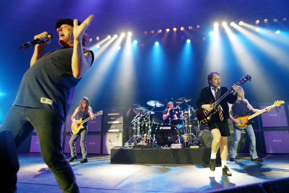 AC/DC perform in Germany in 2003, with Malcolm Young second from left.  Photo: AP