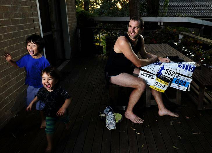 Todd Hayward of Aranda, pictured with children Hugo, 5, and Louis 22 months, is running in the Canberra marathon to raise money for ovarian cancer research. Photo: Melissa Adams