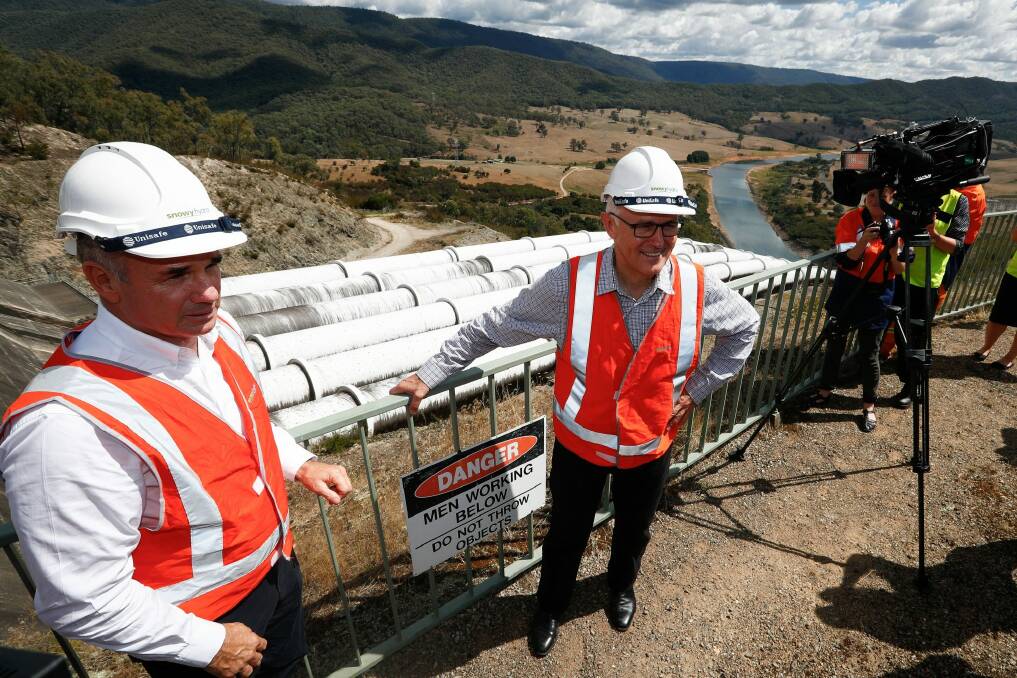 Prime Minister Malcolm Turnbull with Snowy Hydro CEO Paul Broad during his tour of the Snowy Hydro Tumut 3 power station in Talbingo, NSW. Photo: Alex Ellinghausen