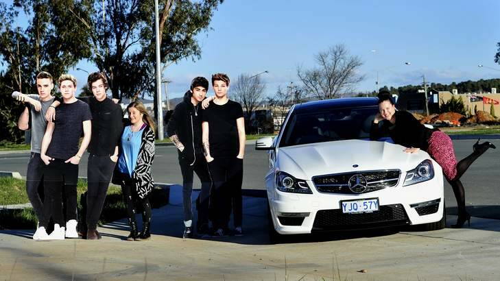 Two Canberra girls L-R Sofia Chieppe, 15 has won tickets to the One Direction film world premiere in London and Rochelle Mayberry, 26 is the winner of a $170,000 Mercedes Benz. Photo: Melissa Adams