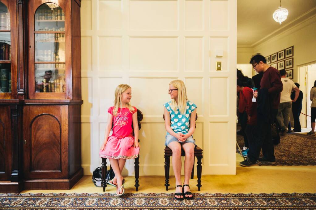 Charlotte, 9, and Sybella Fountain, 6, at the Government House open day on Saturday afternoon. Photo: Rohan Thomson