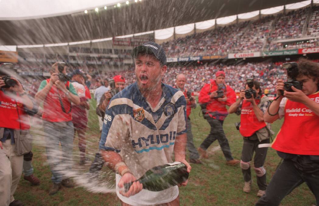 Dean Pay celebrates the Bulldogs' 1995 premiership triumph. Photo: Tim Clayton