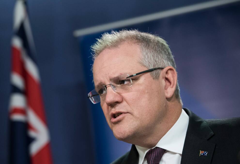 Treasurer Scott Morrison said that if there were to be changes to the tax, "it is my view as Treasurer they will be made in a way that does not disadvantage the budget". Photo: Nic Walker