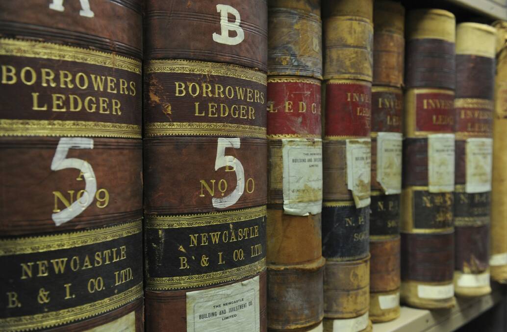 Ledgers from the 1800s at the ANU archives. Photo: Graham Tidy