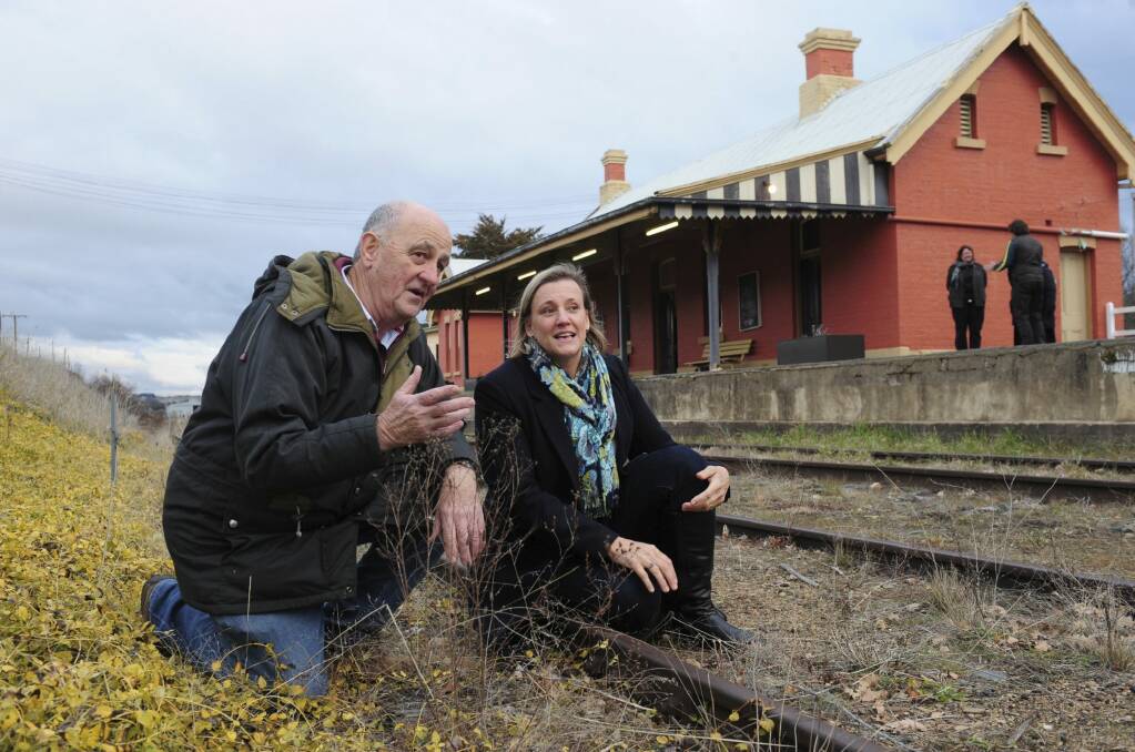 Rail Trails for NSW Inc chairman John Moore and Michelago Region Community Association president Cate Spencer at the Michelago railway station. Photo: Graham Tidy