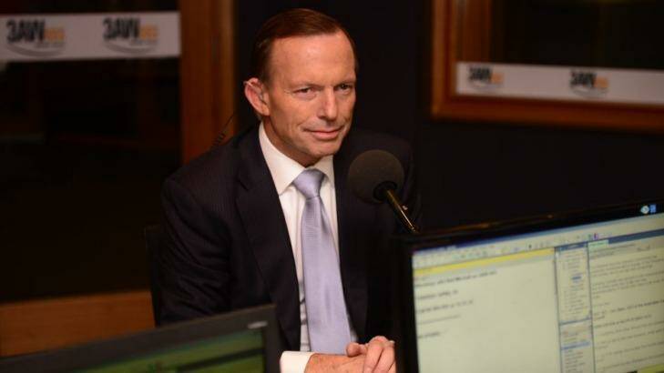 Prime Minister Tony Abbott in Fairfax radio 3AW where he said a temporary deficit tax was not a broken promise. Photo: Penny Stephens