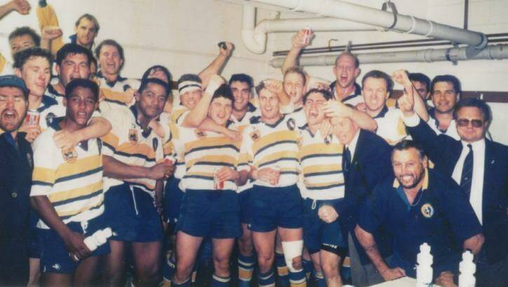 The ACT Kookaburras, in the traditional ACT colours of gold, white and blue, celebrate a win in 1994.
