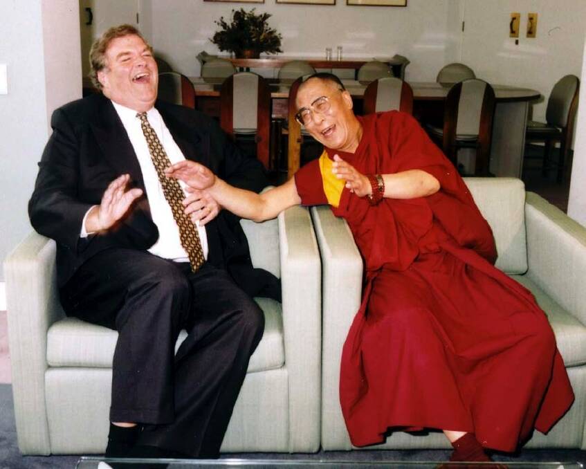 Former Labor leader Kim Beazley shares a joke with the Dalai Lama. Photo: David Foote