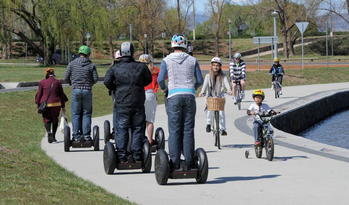 The ACT government will introduce regualtion in 2017 to allow people to ride their own Segways. Photo: Graham Tidy