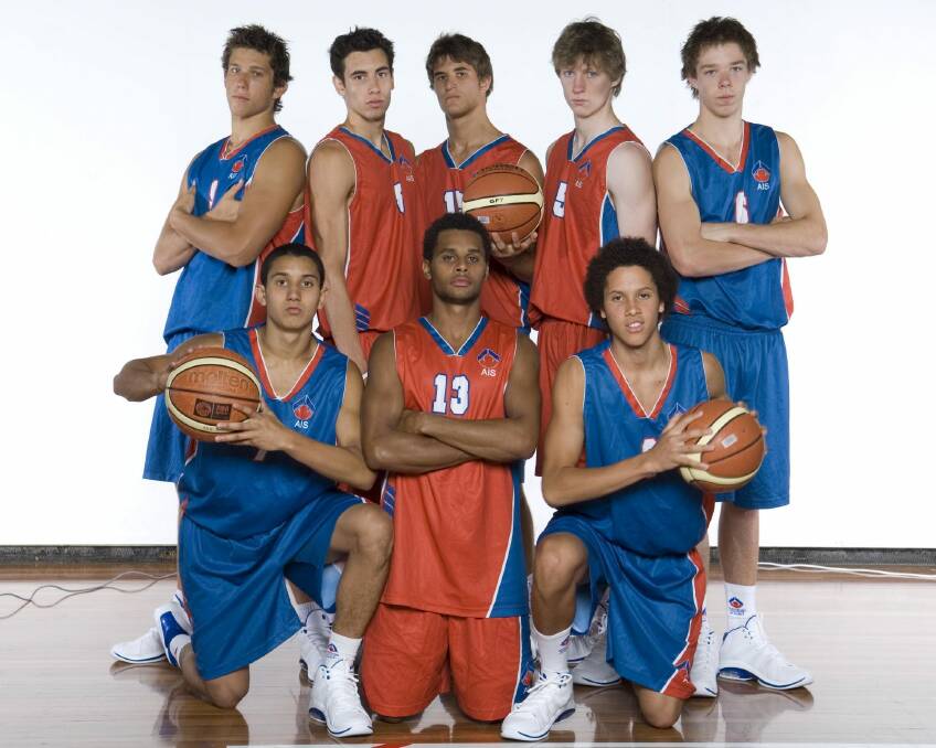Part of a former AIS basketball squad, including Patty Mills, front centre, and Matthew Dellavedova, back right. Photo: AIS