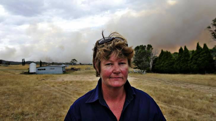 Yalgatta resident Rhonda McCarthy waits on instructions from the RFS after she was evacuated from her home on Tuesday. Photo: Jay Cronan