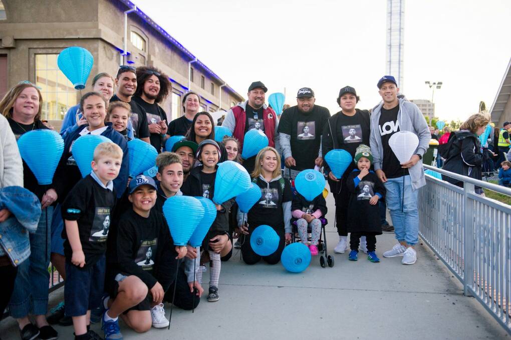 Christian Lealiifano rallies around friends family and the 1000s of supporters at the Canberra Leukaemia Foundation Light the Night walk to help more Australians beat blood cancer through research and support Photo Jay Cronan Photo: Jay Cronan