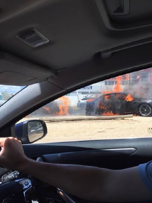 A car bursts into flames off Hindmarsh Drive on Saturday afternoon. Photo: Supplied