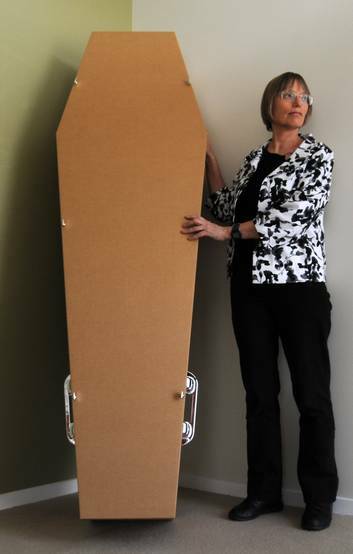 ACT Greens MLA Caroline Le Couteur, pictured with a cardboard coffin in 2011. Photo: Kate Leith