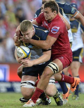 Tom Staniforth takes some stopping against the Reds. Photo: Getty Images