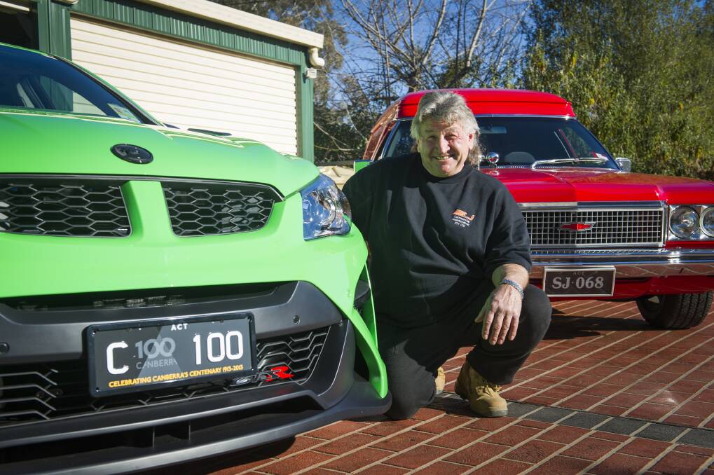 Stefan Jeremenko has the first Centenary of Canberra number plates and a personalised set. Photo: Elesa Kurtz