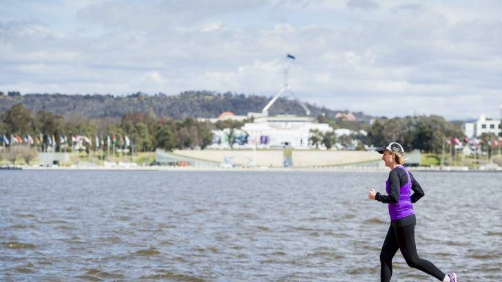 ACT Chief Minister Katy Gallagher, seen here training, competed in the 10km event. Photo: Jay Cronan