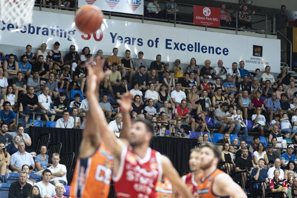 The crowd looks on at the AIS as Illawarra took on Cairns in the NBL. Photo: Lawrence Atkin