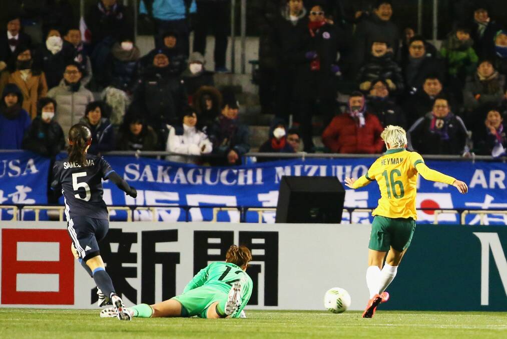 Michelle Heyman scores a crucial goal in the Matildas 3-1 win against Japan. Photo: Koji Watanabe