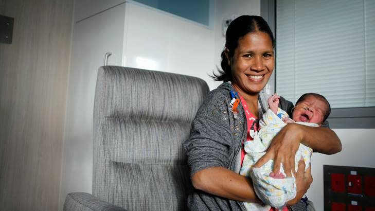 Life-saving ... Lelia De Jesus Andrade with baby Reinaldy, whose care was provided by Rotary. Photo: Katherine Griffiths