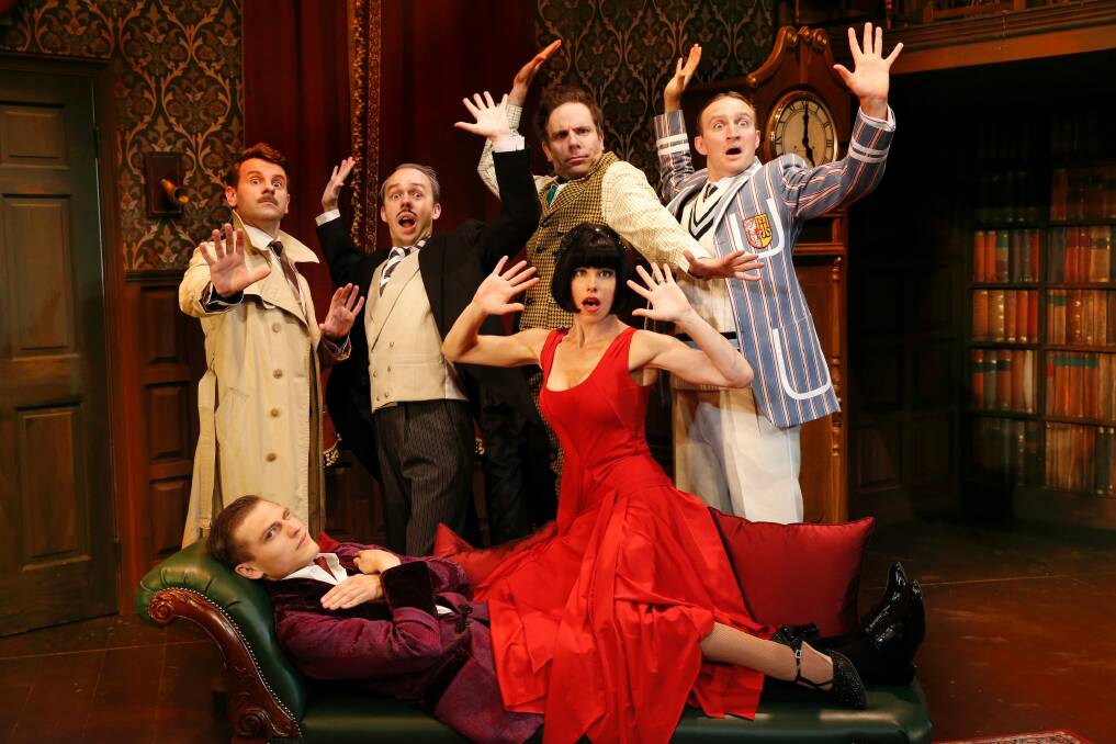 In front: Darcy  Brown (Lying down, purple jacket); Brooke Satchwell (in red dress); rear, from left: Nick Simpson-Deeks ( Trench coat); George Kemp ( moustache); Luke Joslin ( mustard check waistcoat); James Marlowe ( Striped blazer) in <i>The Play That Goes Wrong</i>.  Photo: Jeff Busby