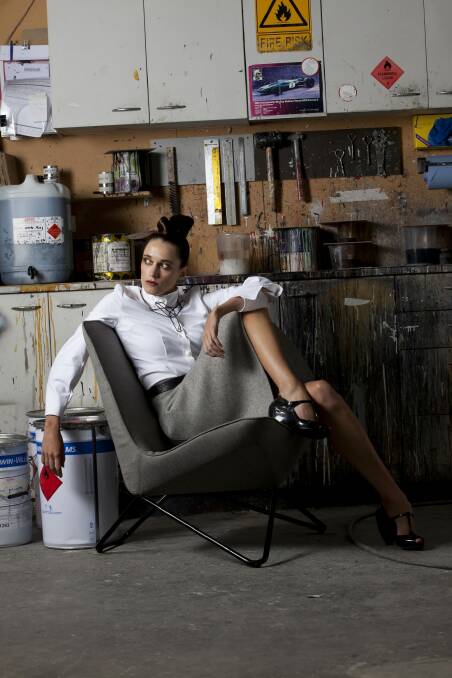Rachelle from HAUS Models wearing a piece from Propaganda, a new collection by fashion design label Corr Blimey, and residential furniture by international company Walter Knoll.  Photo: Leighton Hutchinson 
