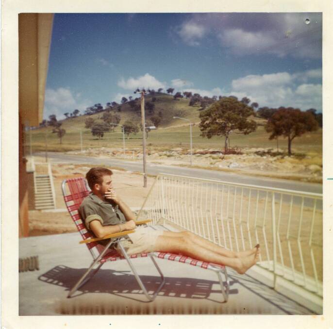 Rosalie Lovell's husband on their front verandah looking over Champion’s farm that eventually become the suburb of Chapman. Photo: Rosalie Lovell