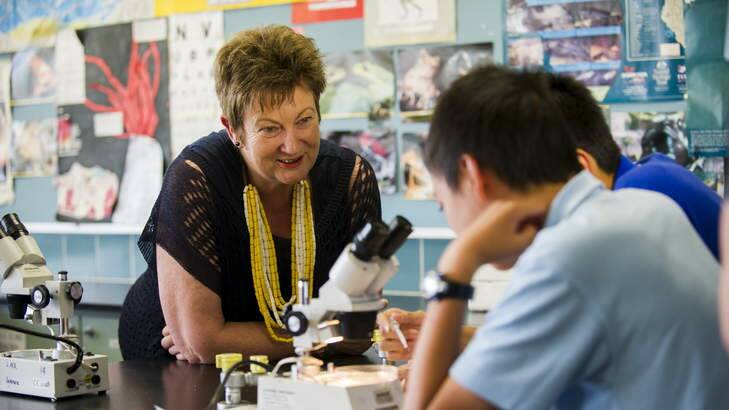 Lyneham High School principal Colleen Matheson speaks to students in the year 8 science class at the school. Photo: Rohan Thomson