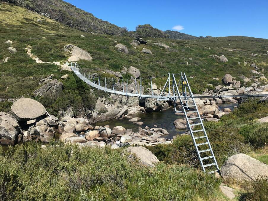 The spectacular Illawong suspension bridge over the Snowy River. Photo: Tim the Yowie Man