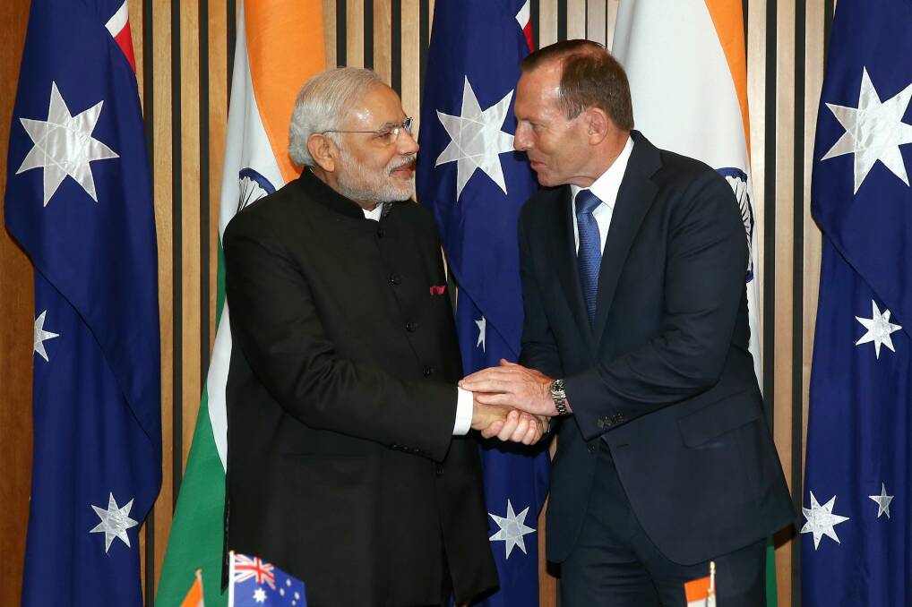 Good rapport: Narendra Modi and Tony Abbott in Parliament House on Tuesday morning. Photo: Alex Ellinghausen