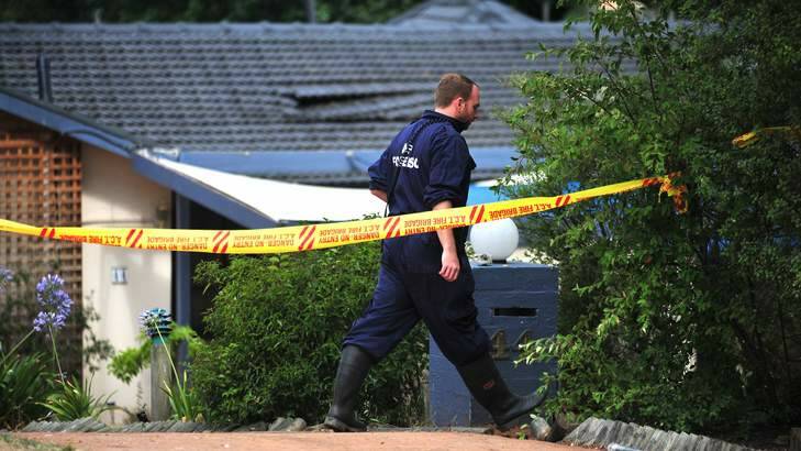 Police and other investigators say the fire at a Red Hill residence on Saturday may be suspicious. Photo: Katherine Griffiths