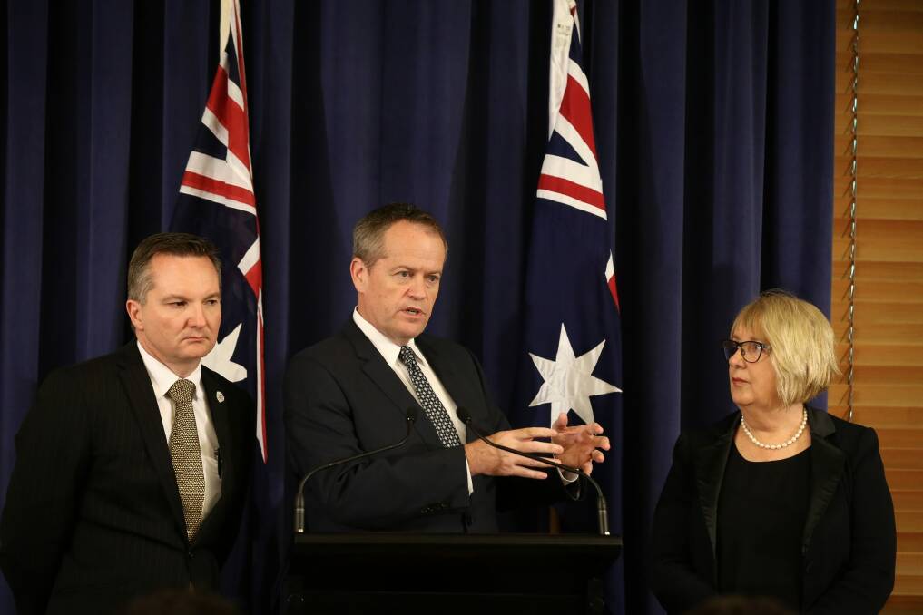 Opposition Leader Bill Shorten addresses the media during a joint press conference with shadow treasurer Chris Bowen and opposition spokeswoman for families and payments, Jenny Macklin. Photo: Alex Ellinghausen