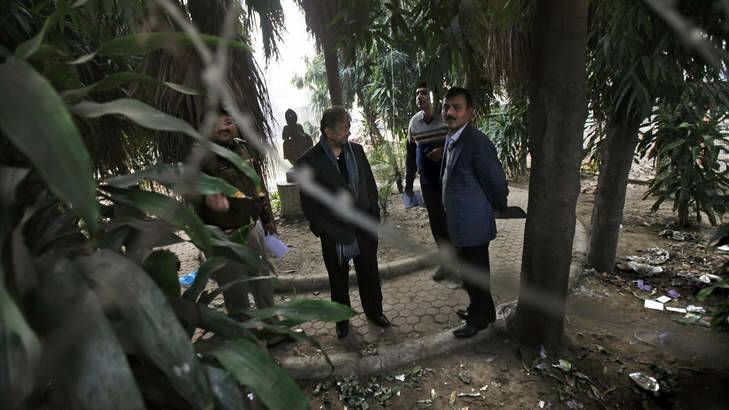 Investigators in New Delhi at the spot of the assault. Photo: AP
