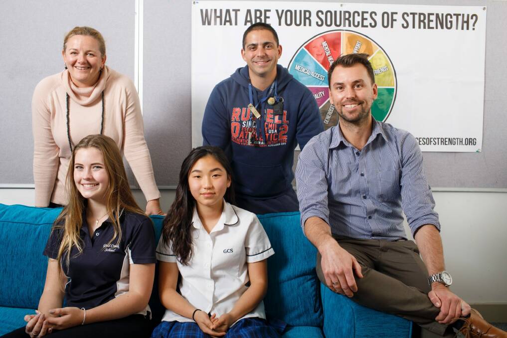 Gold Creek School has a pilot program called Sources of Strength which aims to build resilience. Principal Angela Spence, Isabelle Gaul, Jodie Chang, Brent Felix, and Bradley Lynch. Photo: Sitthixay Ditthavong