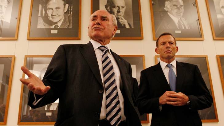 Former Prime Minister John Howard and Opposition Leader Tony Abbott in the Party Room at Parliament House. Many of Mr Howard's former ministers will be ready to resume their roles should the Coalition regain power with Mr Abbott at the helm. Photo: Andrew Meares