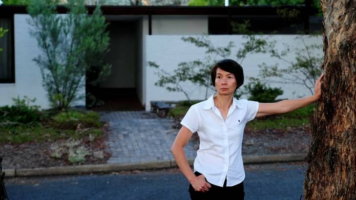 Home owner Tanya Nguyen outside a property on Mugga Way, Red Hill, which is owned by Sublime shareholder Dee Sisomphou. Photo: Melissa Adams