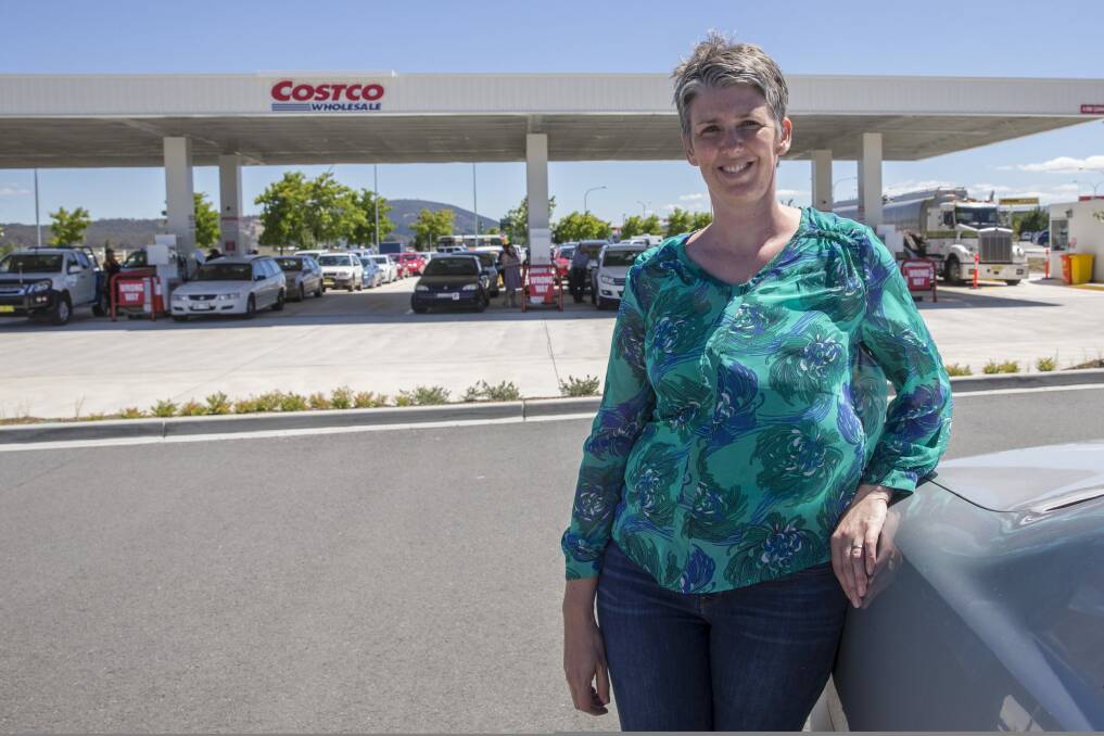 Mary Colls of Belconnen was happy enough to wait in line for the low fuel prices at Costco. Photo: Matt Bedford