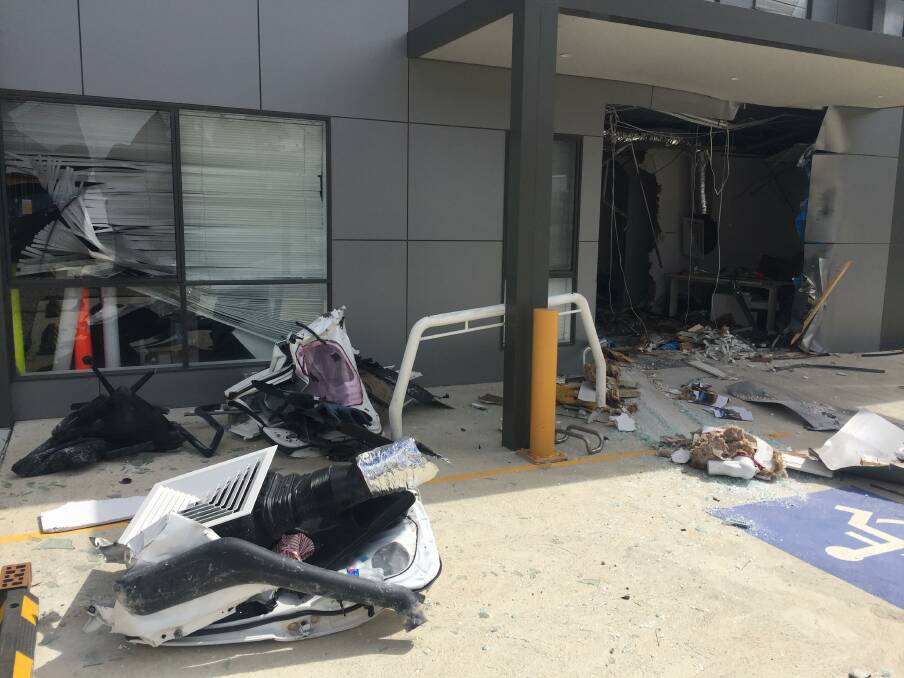 Parts of the building and the Toyota Hilux outside the building. Photo: Finbar O'Mallon