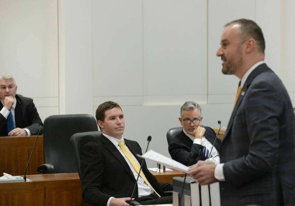Opposition leader Alistair Coe listens as ACT Chief Minister Andrew Barr responds to claims of corruption levied against his government.  Photo: Sitthixay Ditthavong