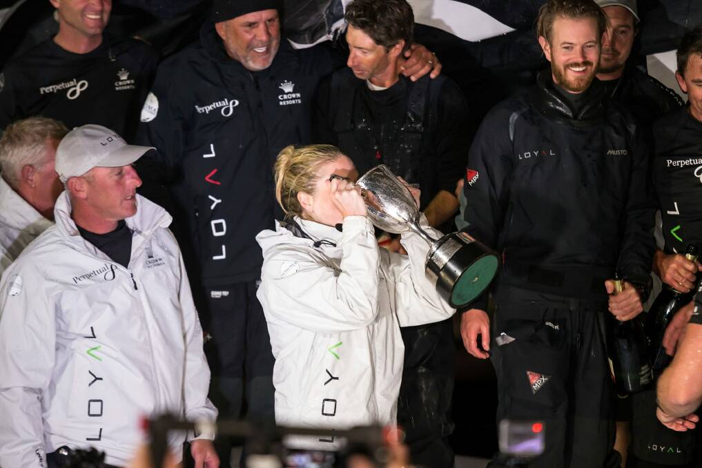 Perpetual Loyal crew member Erin Molan celebrates with sponsors and fellow crew at Constitution Dock after winning the 2016 Sydney To Hobart in record time.  Photo: Heath Holden