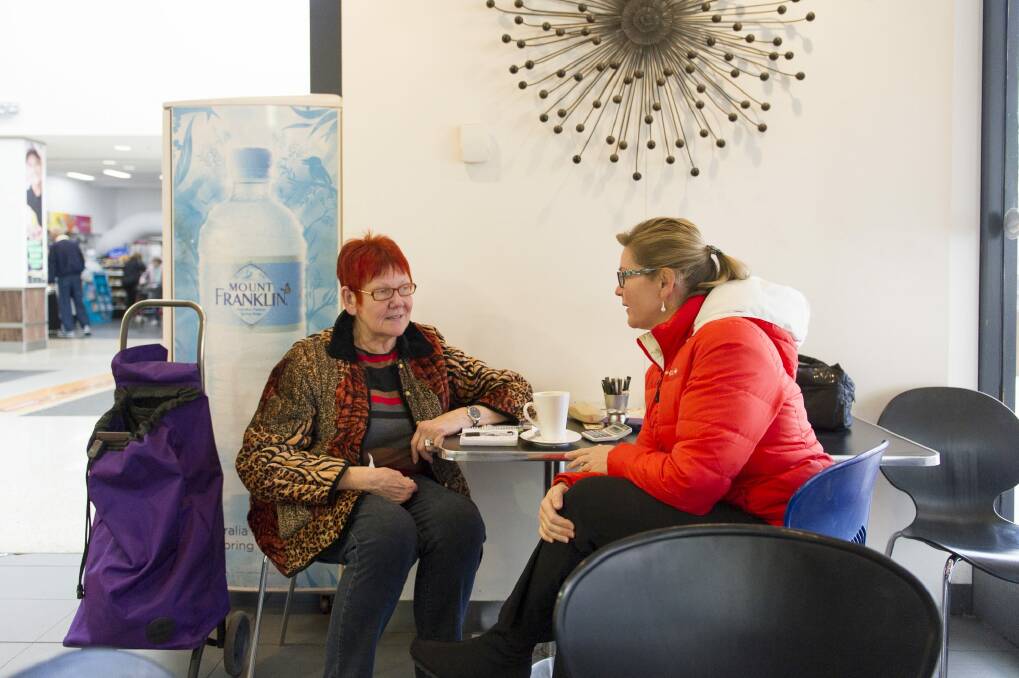 Loyal customers at Sakeena's Cafe, Wendy Park and Dr Karin Elix, say the Cooleman Court cafe is part of the fabric of the local community. Photo: Jay Cronan