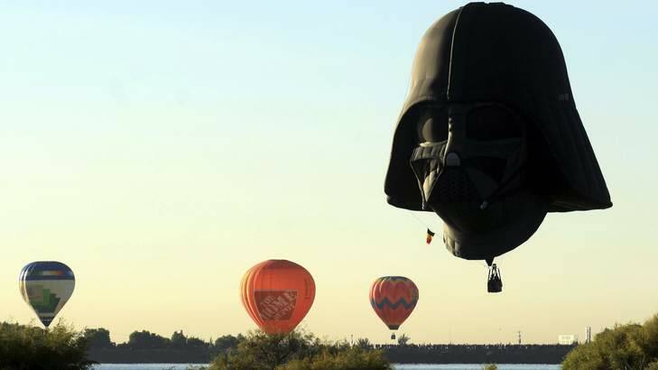 A hot air balloon in the shape of Darth Vader will come to Australia for the first time for Canberra's Balloon Spectacular. Photo: Reuters