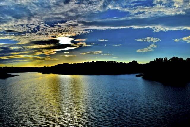 Graham Hine captured a colourful summer evening over Lake Ginninderra.  Photo: Graham Hine