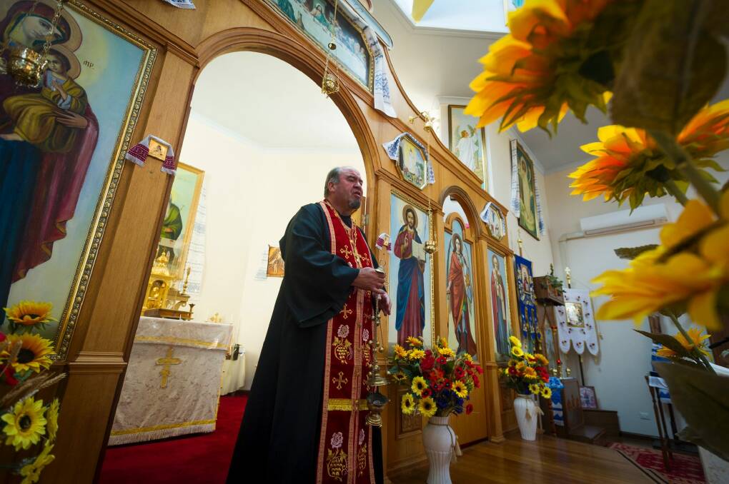  Father Michael Solomko leading the service. Photo: Dion Georgopoulos