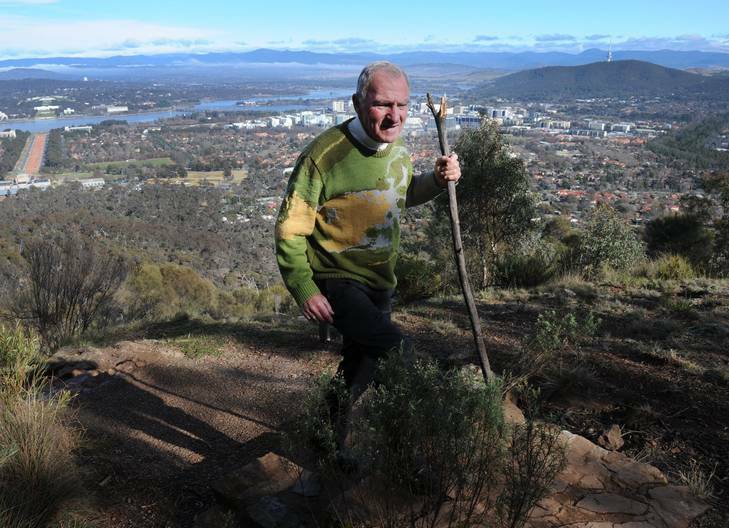 Retired Roman Catholic Auxiliary Bishop of Canberra and Goulburn, 70 year old, Pat Power, regularly walks the trail to the summit of Mount Ainslie. Photo: Graham Tidy