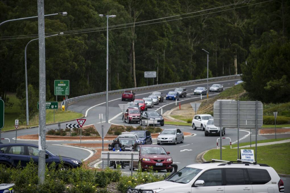 About three kilometres of stop-start traffic banked up at the Batemans Bay roundabout at the south coast on Saturday. Photo: Rohan Thomson