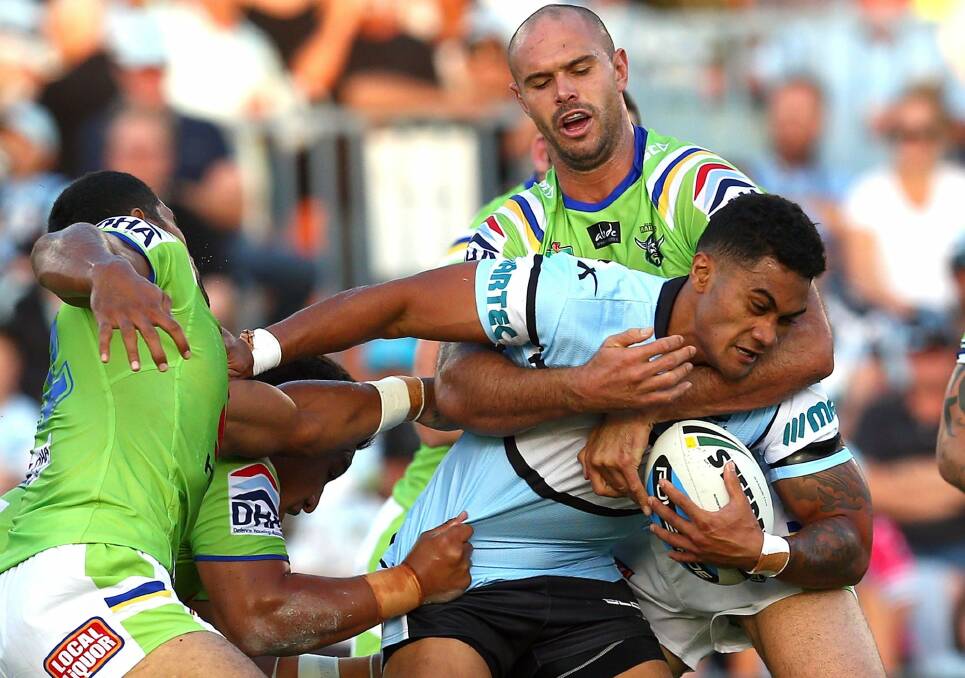 Dane Tilse makes a tackle for the Raiders in their 2015 NRL season-opener against the Sharks. Photo: Getty Images