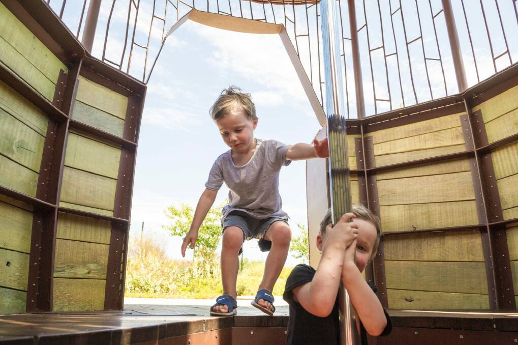 James and Lewis Gunn playing in the Arboretum playground.  Photo: Jay Cronan