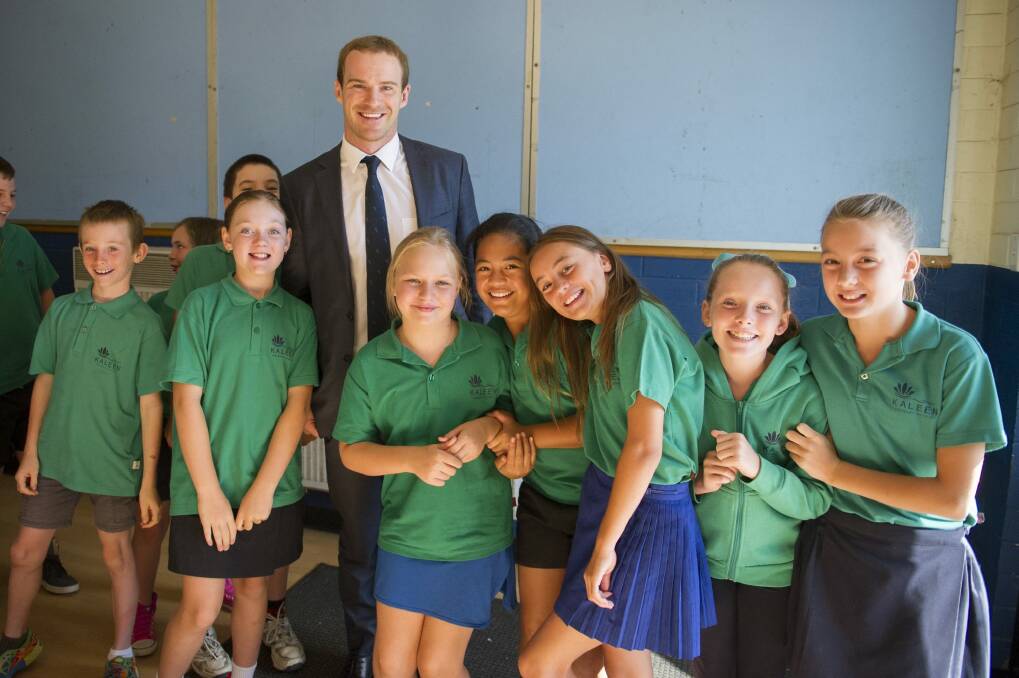 Former Brumbies and Wallabies player Pat McCabe with students of Kaleen Primary School at the Say No to Racism Program.  Photo: Jay Cronan