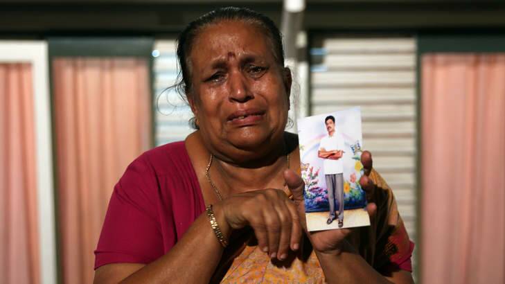 Protesting for human rights in Colombo ... Tangaraja Rajeshwari, a woman belonging to the Sri Lankan minority Tamil ethnic group, holds up a photo of her son who disappeared during the final stage of the Sri Lankan Civil War. Photo: Getty Images